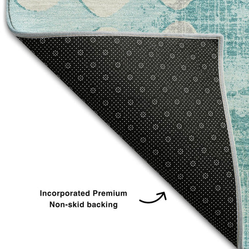 5' X 8' Teal And Ivory Polka Dot Washable Area Rug With UV Protection