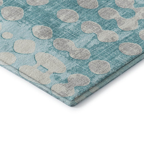 5' X 8' Teal And Ivory Polka Dot Washable Area Rug With UV Protection
