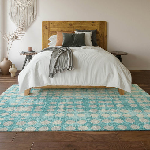 5' X 8' Teal And Ivory Polka Dot Washable Area Rug With UV Protection