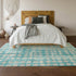 5' X 8' Teal And Ivory Polka Dot Washable Area Rug With UV Protection