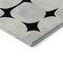 5' X 8' Black And Ivory Abstract Geometric Washable Area Rug With UV Protection