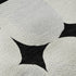 5' X 8' Black And Ivory Abstract Geometric Washable Area Rug With UV Protection