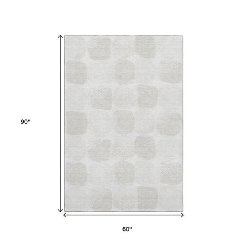 5' X 8' Ivory And Beige Abstract Geometric Washable Area Rug With UV Protection
