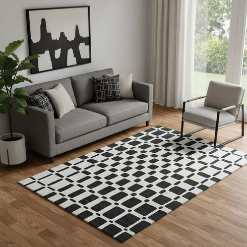 5' X 8' Black And Ivory Geometric Washable Area Rug With UV Protection