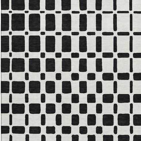 5' X 8' Black And Ivory Geometric Washable Area Rug With UV Protection