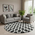 8' Black And Ivory Geometric Washable Round Rug With UV Protection
