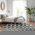 8' Black And Ivory Geometric Washable Round Rug With UV Protection