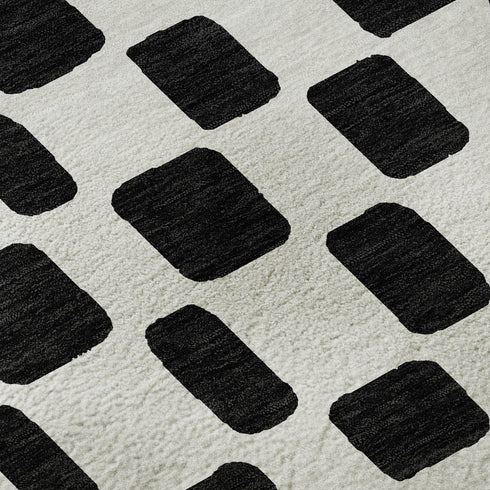8' Black And Ivory Geometric Washable Round Rug With UV Protection