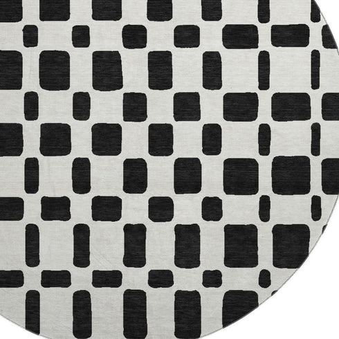8' Black And Ivory Geometric Washable Round Rug With UV Protection