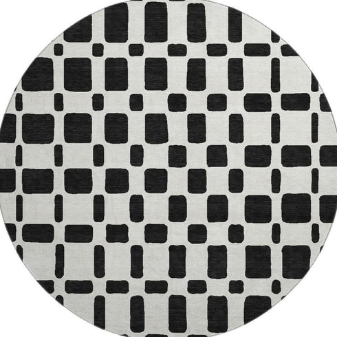 8' Black And Ivory Geometric Washable Round Rug With UV Protection