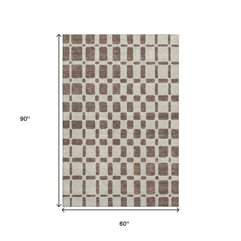 5' X 8' Brown And Ivory Geometric Washable Area Rug With UV Protection