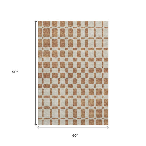 5' X 8' Terra Cotta And Beige Geometric Washable Area Rug With UV Protection
