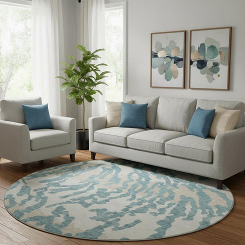 8' Teal And Ivory Animal Print Washable Round Rug With UV Protection