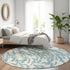 8' Teal And Ivory Animal Print Washable Round Rug With UV Protection