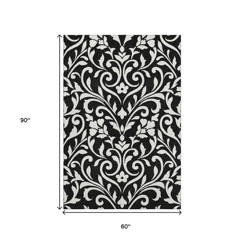 5' X 8' Black And Ivory Floral Washable Area Rug With UV Protection
