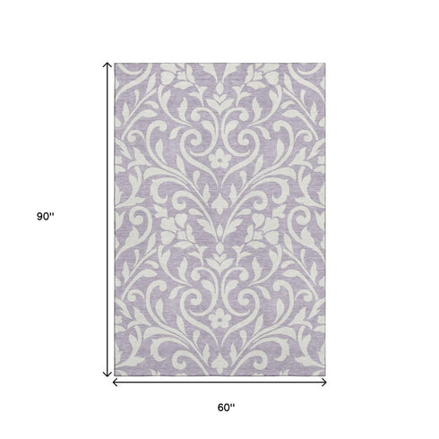 5' X 8' Lavender And Ivory Floral Washable Area Rug With UV Protection