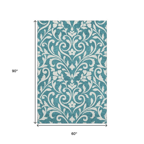 5' X 8' Teal And Ivory Floral Washable Area Rug With UV Protection