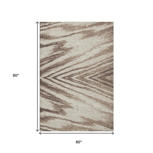 5' X 8' Brown And Beige Abstract Washable Area Rug With UV Protection