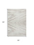 5' X 8' Ivory And Beige Abstract Washable Area Rug With UV Protection