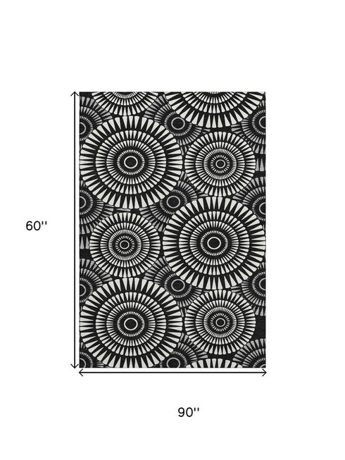 5' X 8' Black And Ivory Geometric Washable Area Rug With UV Protection