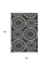 5' X 8' Black And Ivory Geometric Washable Area Rug With UV Protection