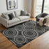 5' X 8' Black And Ivory Geometric Washable Area Rug With UV Protection