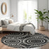 8' Black And Ivory Geometric Washable Round Rug With UV Protection