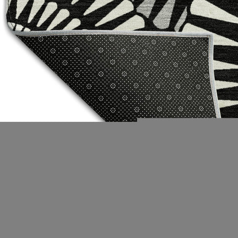 8' Black And Ivory Geometric Washable Round Rug With UV Protection