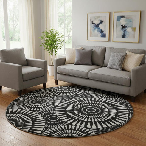 8' Black And Ivory Geometric Washable Round Rug With UV Protection