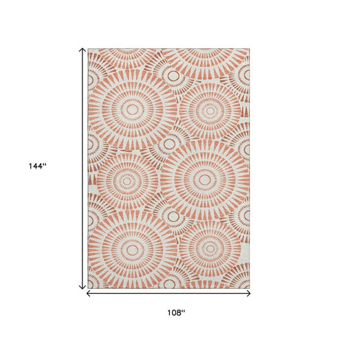 9' X 12' Coral And Ivory Geometric Washable Area Rug With UV Protection