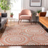 9' X 12' Coral And Ivory Geometric Washable Area Rug With UV Protection