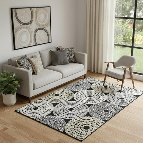 5' X 8' Black Beige And Ivory Geometric Washable Area Rug With UV Protection