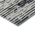 5' X 8' Black And Ivory Striped Washable Area Rug With UV Protection