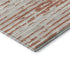 5' X 8' Coral And Ivory Striped Washable Area Rug With UV Protection