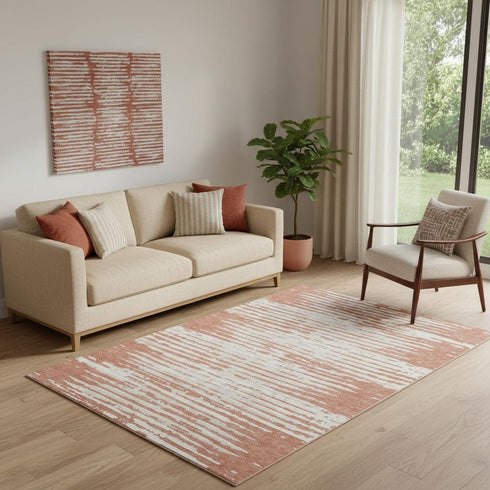 5' X 8' Coral And Ivory Striped Washable Area Rug With UV Protection