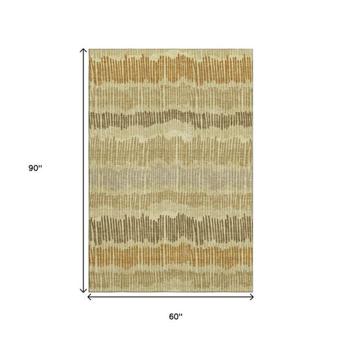 5' X 8' Gold Beige And Rust Striped Washable Area Rug With UV Protection