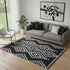 5' X 8' Black And Ivory Geometric Washable Area Rug With UV Protection