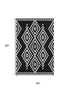 5' X 8' Black And Ivory Geometric Washable Area Rug With UV Protection