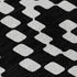 5' X 8' Black And Ivory Geometric Washable Area Rug With UV Protection