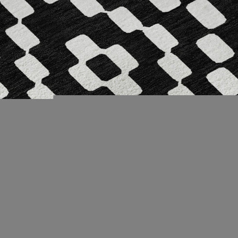 8' Black And Ivory Geometric Washable Round Rug With UV Protection