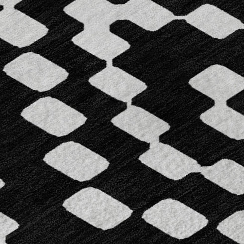 8' X 10' Black And Ivory Geometric Washable Area Rug With UV Protection