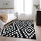 9' X 12' Black And Ivory Geometric Washable Area Rug With UV Protection