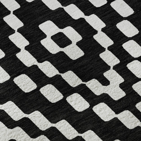 9' X 12' Black And Ivory Geometric Washable Area Rug With UV Protection