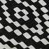 9' X 12' Black And Ivory Geometric Washable Area Rug With UV Protection