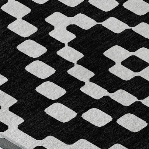 9' X 12' Black And Ivory Geometric Washable Area Rug With UV Protection
