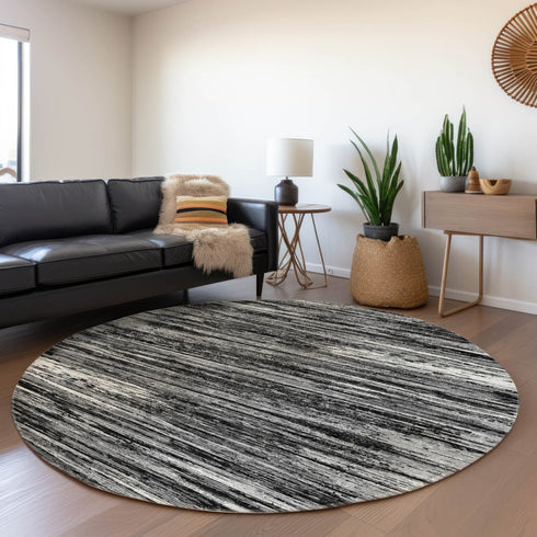 8' Black And Ivory Striped Washable Round Rug With UV Protection