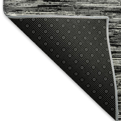 8' Black And Ivory Striped Washable Round Rug With UV Protection