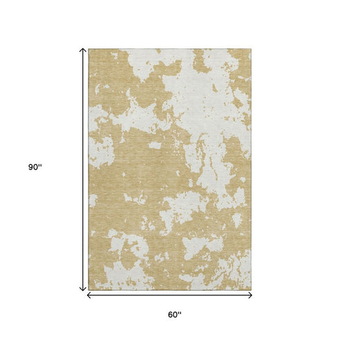 5' X 8' Gold And Beige Abstract Washable Area Rug With UV Protection
