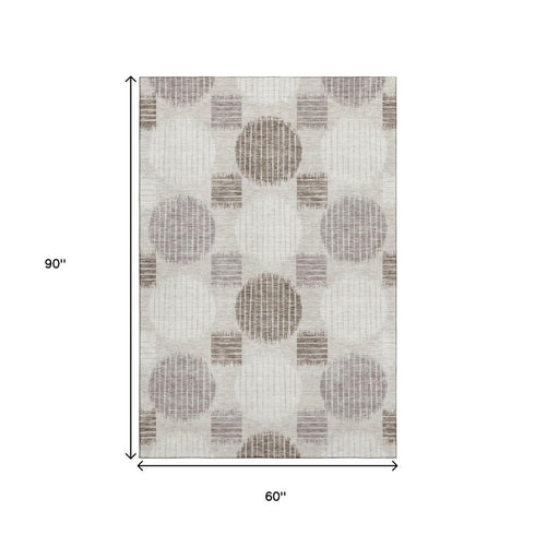 5' X 8' Beige Ivory And Taupe Geometric Washable Area Rug With UV Protection