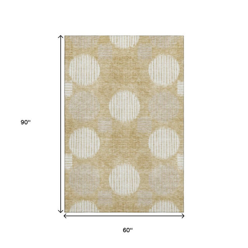 5' X 8' Gold And Ivory Geometric Washable Area Rug With UV Protection